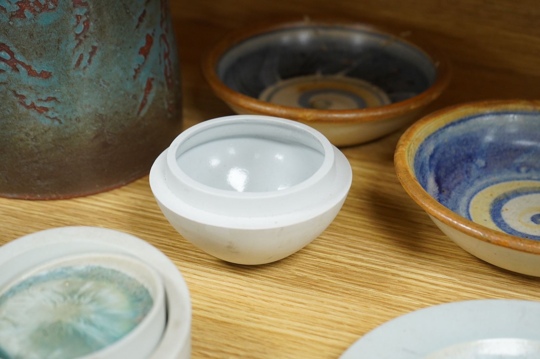 A collection of studio pottery to include crystalline glazed works by Stephen R Jones Des, Brighton, vases and a pair of dishes, largest 22cm high